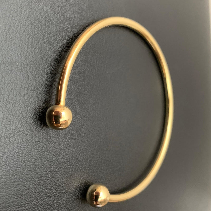 Bracelete Maciço Ouro18 kilates 15 Gramas 6 mm resistente Modelo Polido sem fecho e bolas 10 mm