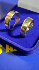 Alianças Ouro 18 kilates Peso 9 .10  Gramas 7 mm Lisa Blilhosa