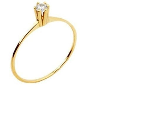 Anel ouro 18 kilates com pedra de brilhante 3mm  2 gramas