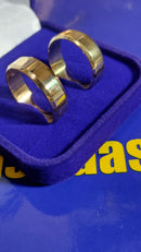 Alianças Ouro 18 kilates Peso 9 .10  Gramas 7 mm Lisa Blilhosa