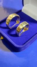 Alianças Ouro 18 kilates Peso 9 .10  Gramas 7 mm Lisa Blilhosa